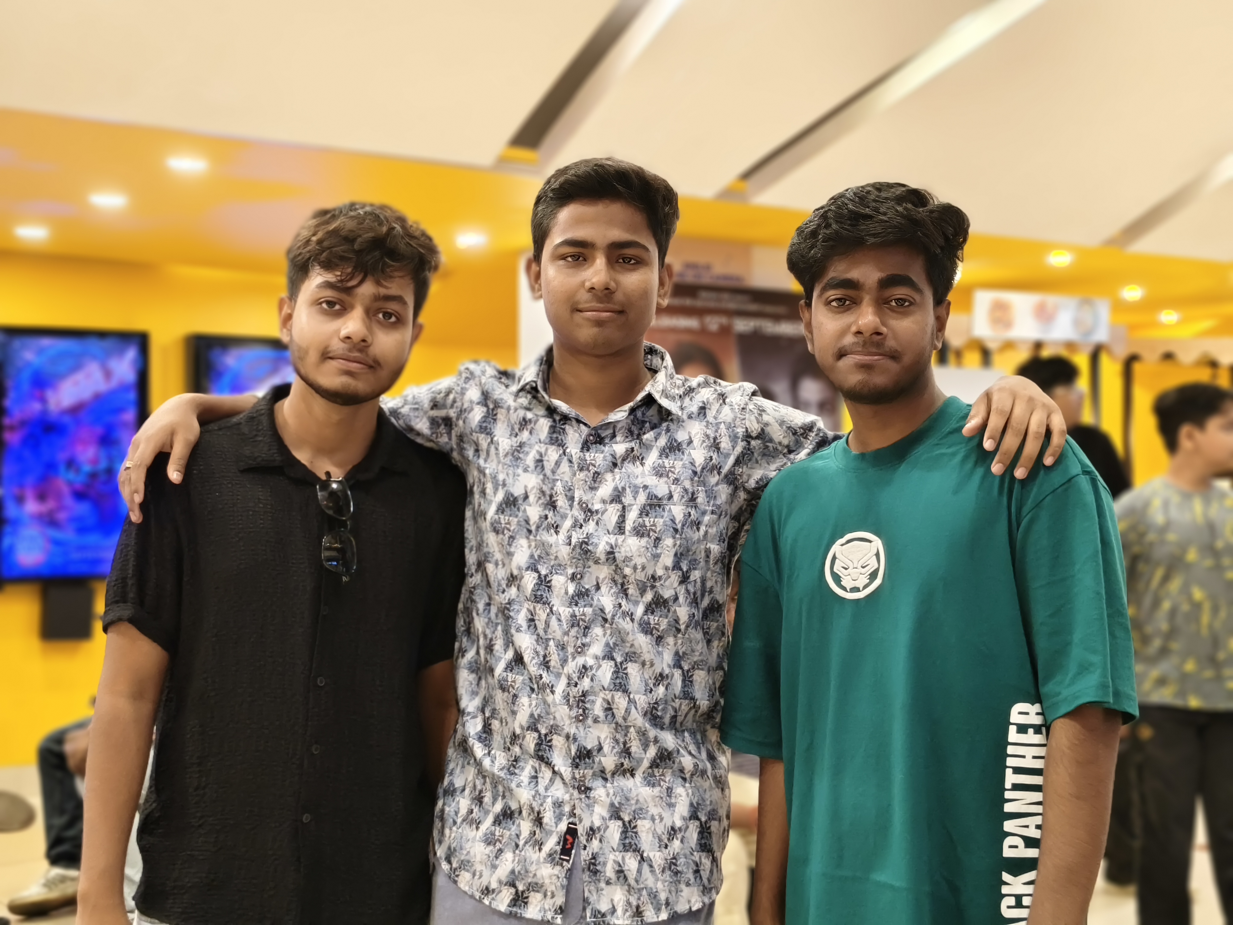A photo of the three-person team